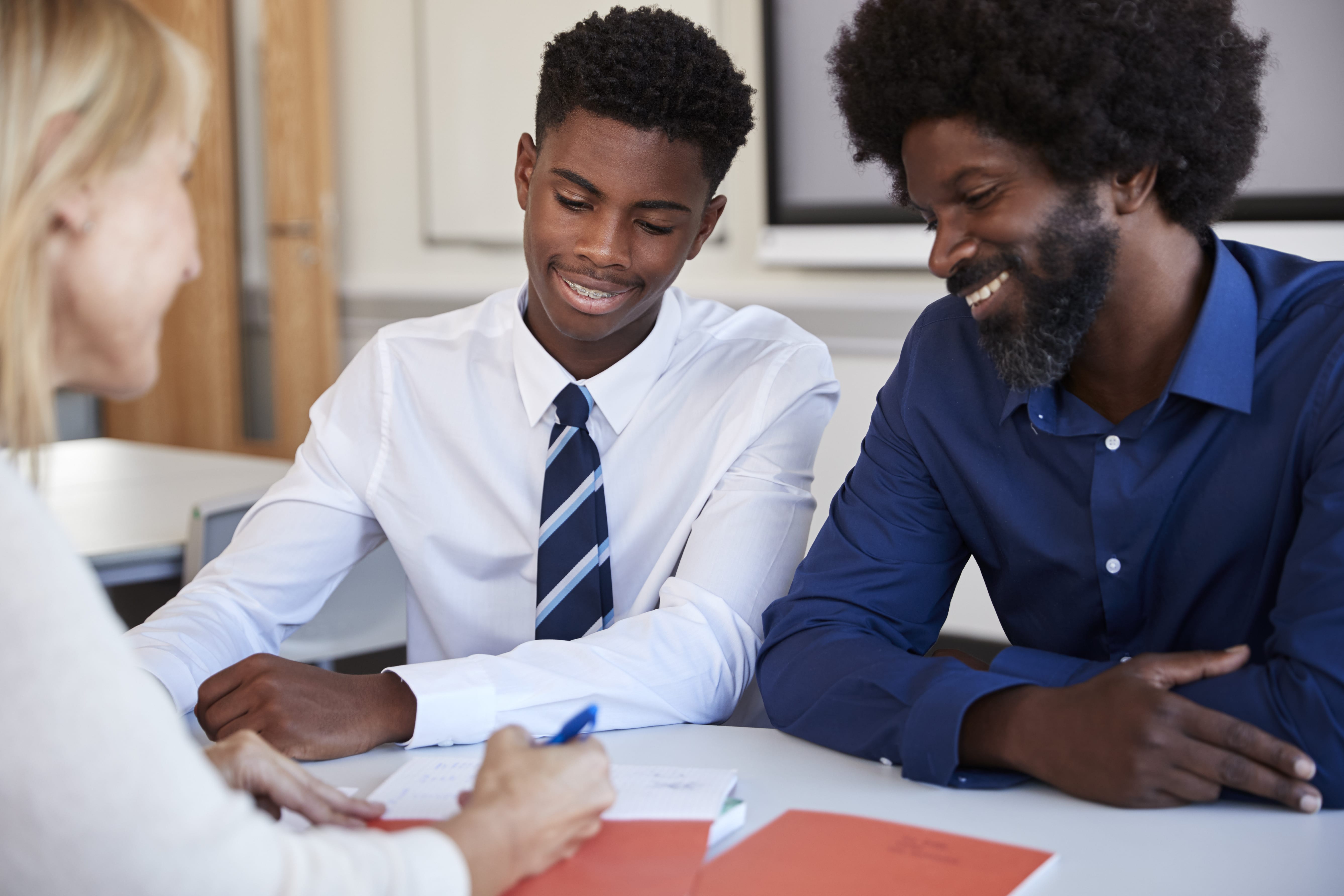 father-and-teenage-son-having-discussion-with-fema-2021-08-26-16-15-14-utc-min